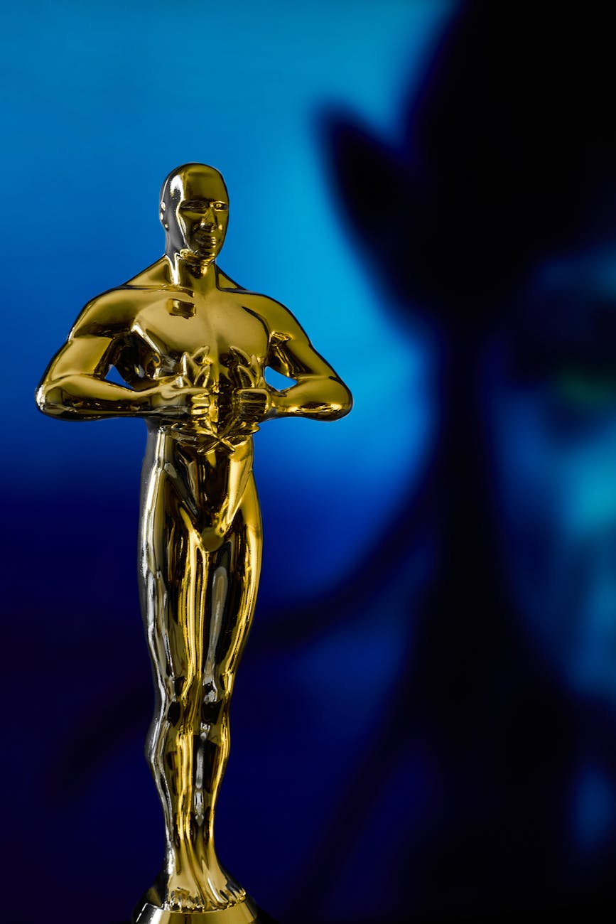 Best Picture Oscar statue with a disappointed expression.